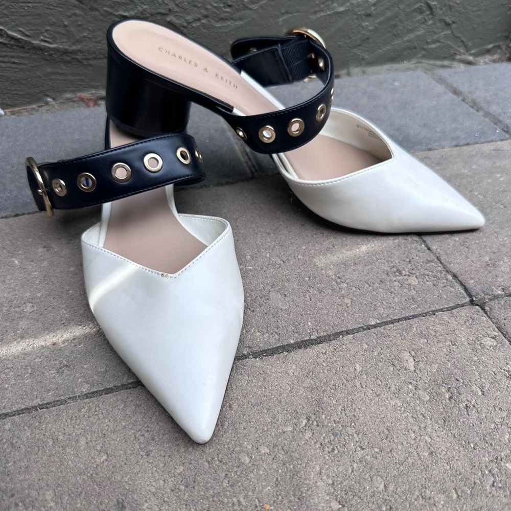 Charles & Keith White Pointed-Toe Mules with Black Studded Strap